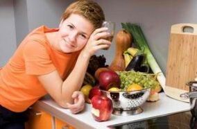 A girl on a table with useful products